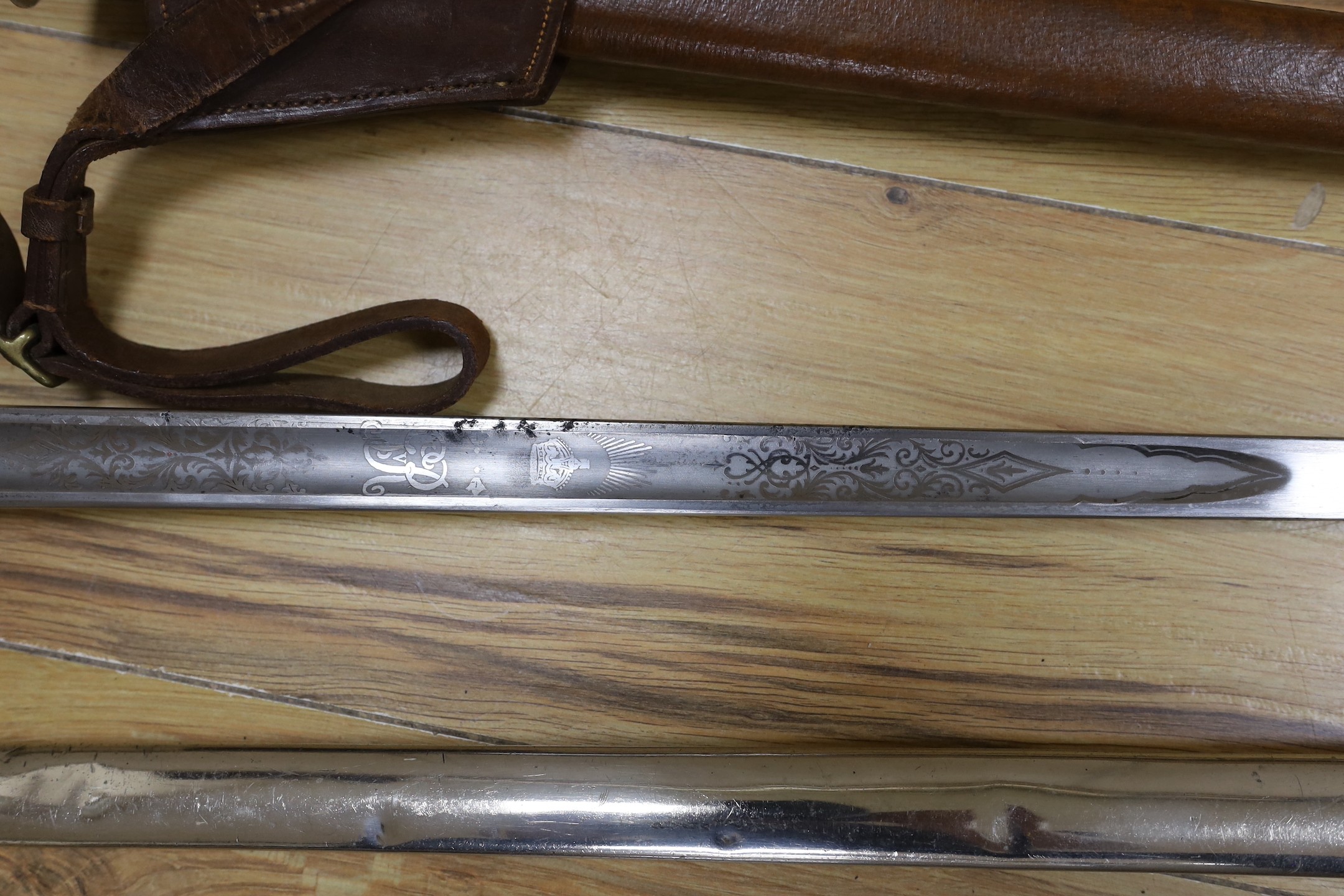 Two George V infantry officer's swords, 100cms long.